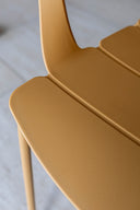 Montauk - Lot de 4 fauteuils de table extérieur en polypropylène et métal ocre